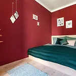 Colorful Apartment Facing Green Courtyard