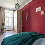 Colorful Apartment Facing Green Courtyard